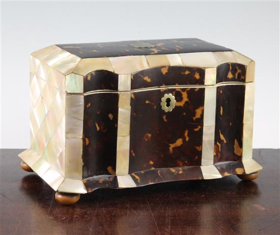 An early Victorian mother of pearl and tortoiseshell tea caddy, 8in.